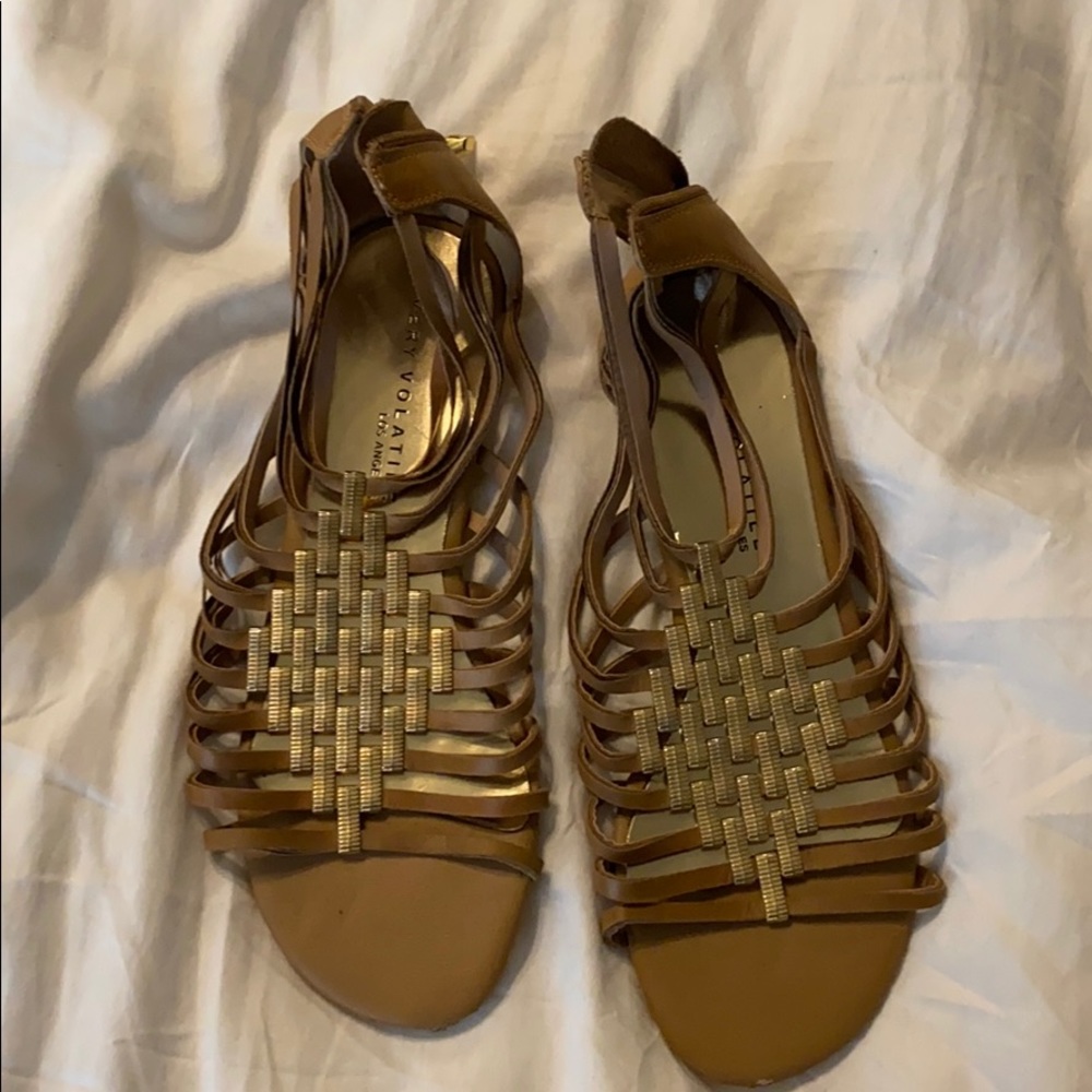 strappy sandals with gold accent